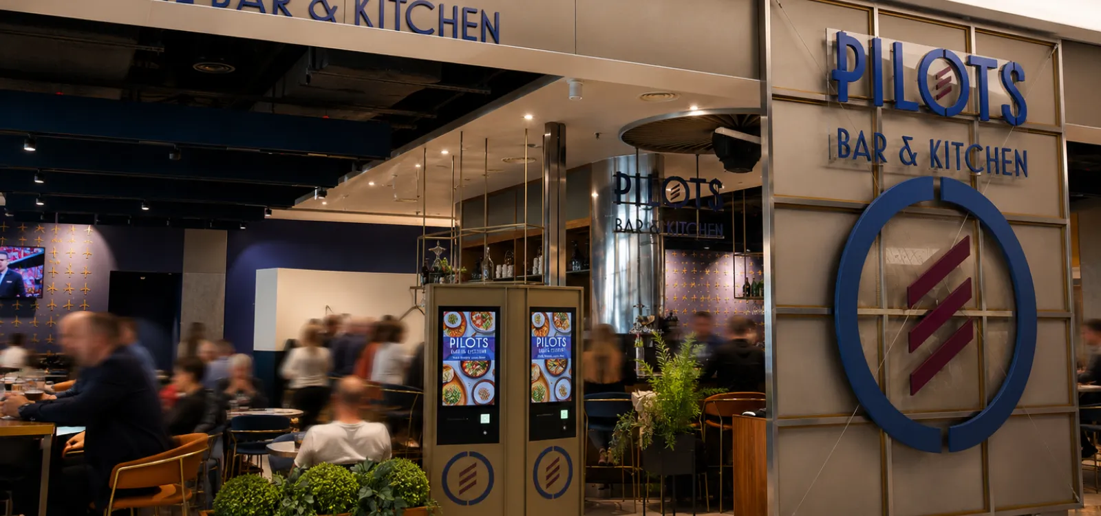People eating at an airport restaurant