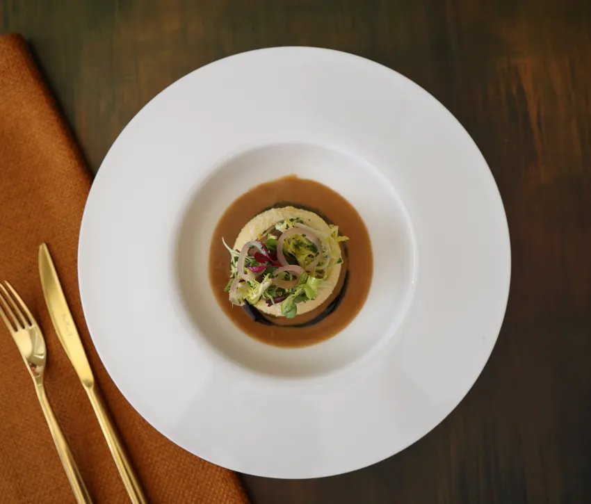 Twice-baked Onion Soufflé as a starter from the new autumn winter 2026 menu