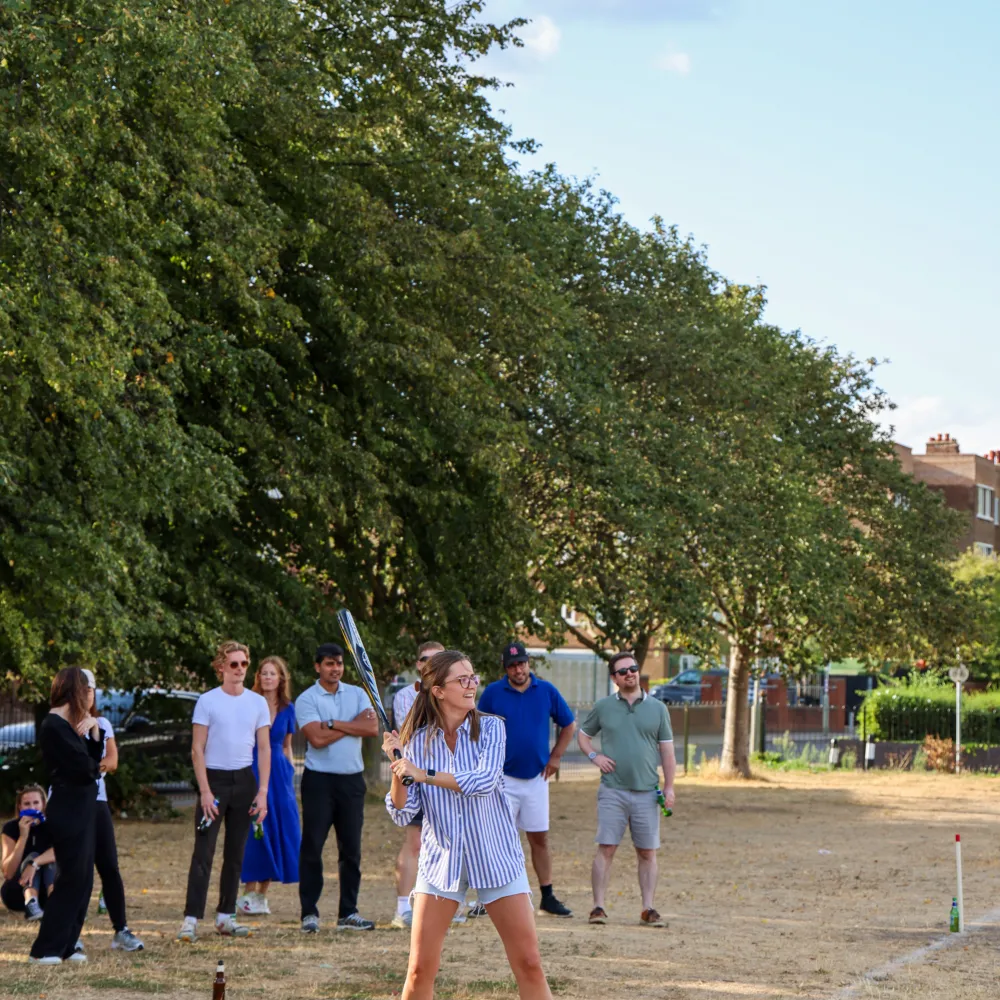 Girl playing rounders at a charitey fundraiser 