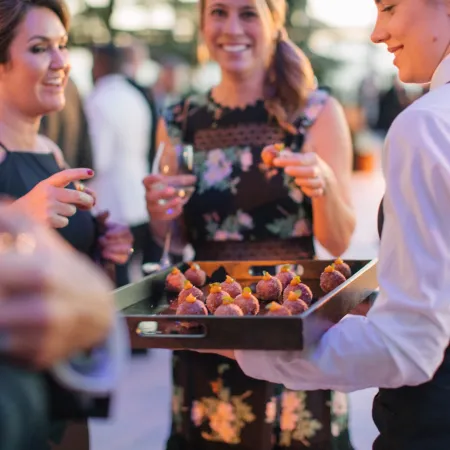 Canape on tray service staff waiter