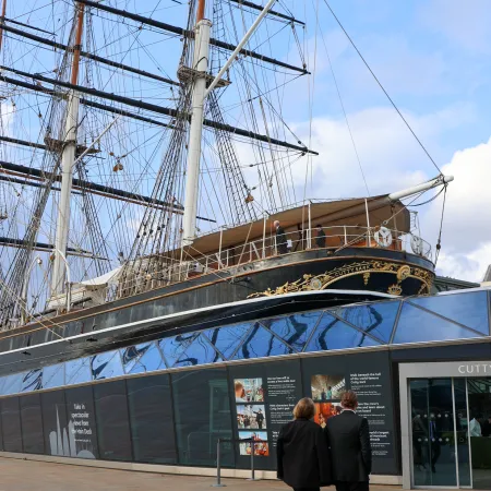 The Cutty Sark in Greenwich, with guests arriving for an evening event.