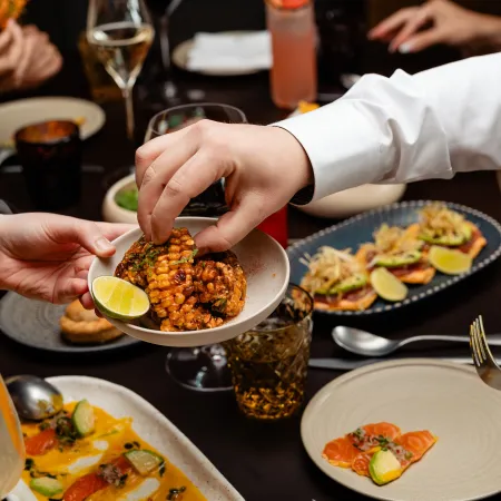 A variety of dishes and drinks served at a dining table in Elemente Hamburg