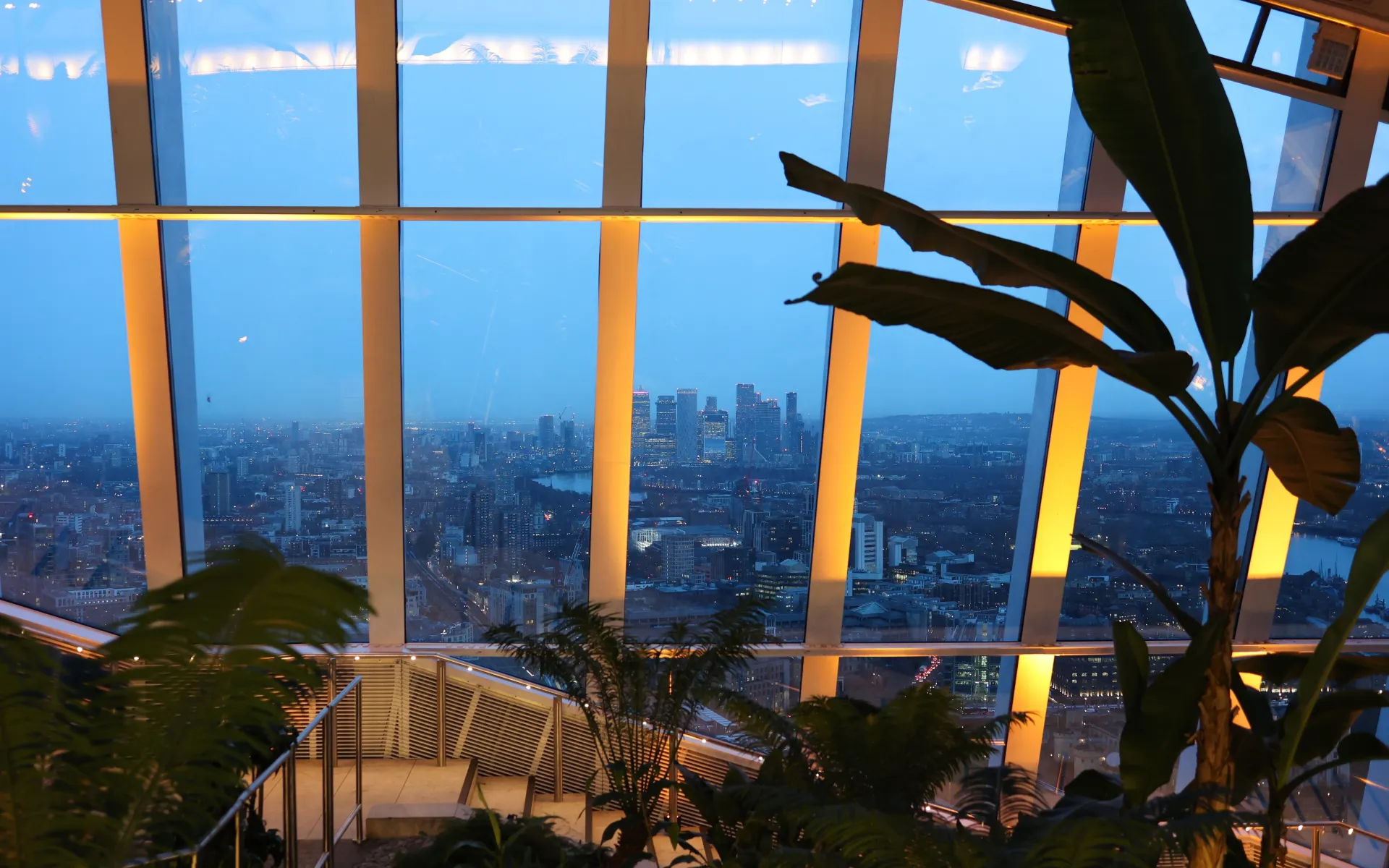 Modern interior of Sky Garden overlooking London skyline