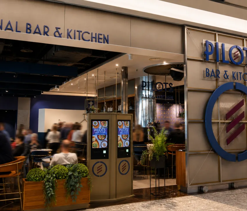 People eating at an airport restaurant