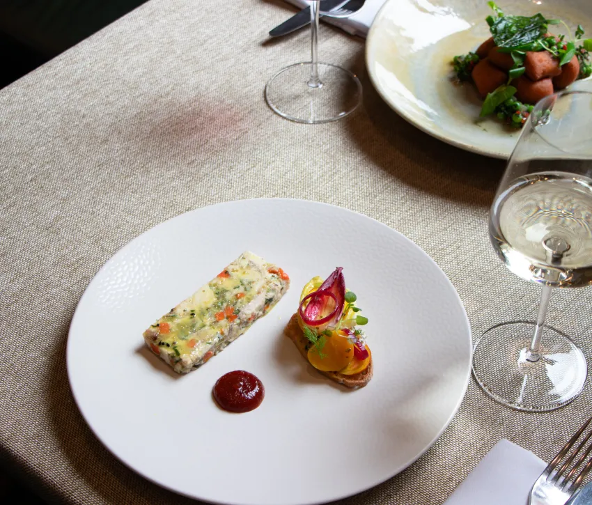 Seasonal starter served with a glass of white wine at The Elgar Room