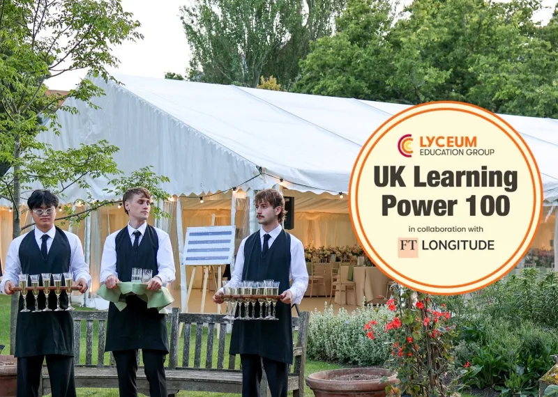 Chelsea physic garden - staff waiters holding drinks trays - Logo of Uk Leaning Power 100